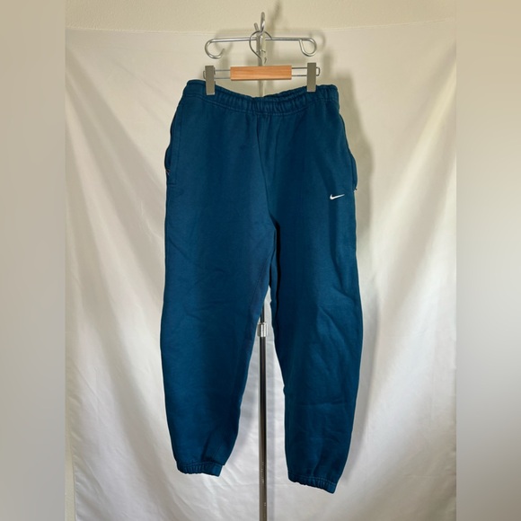 Nike Solo Swoosh Fleece Pants Mens Blue Loose Tapered Pull-On Heavyweight - Picture 1 of 3